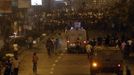 Riot police armoured personnel carriers fire rubber bullets and tear gas at members of the Muslim Brotherhood and supporters of ousted Egyptian President Mohamed Mursi during clashes with anti-Mursi protesters along a road at Ramsis square, which leads to Tahrir Square, at a celebration marking Egypt's 1973 war with Israel, in Cairo October 6, 2013. At least 44 people were killed during protests across Egypt on Sunday, a security source and the state news agency said.