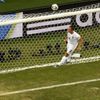 England's Jagielka saves the ball during the 2014 World Cup Group D soccer match between England and Italy at the Amazonia arena in Manaus