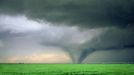 Large tornado North of Gruver Texas wide showing green wheat field and Zimmatic filed irrigation sy Large Wedge Tornado North East of Gruver Texas over green wheat field. Rated F3 on the Fujita scale this tornado caused extensive damage in Oklahoma and Kansas although no deaths reported with this storm. Showing a Zimmatic advanced irrigation control systems that utilize the most up-to-date computer technology. Keywords Willett and Tornado to see other images of this same tornado or keyword Lightningsmiths to see my other tornado and severe weather images. May 5th 1993