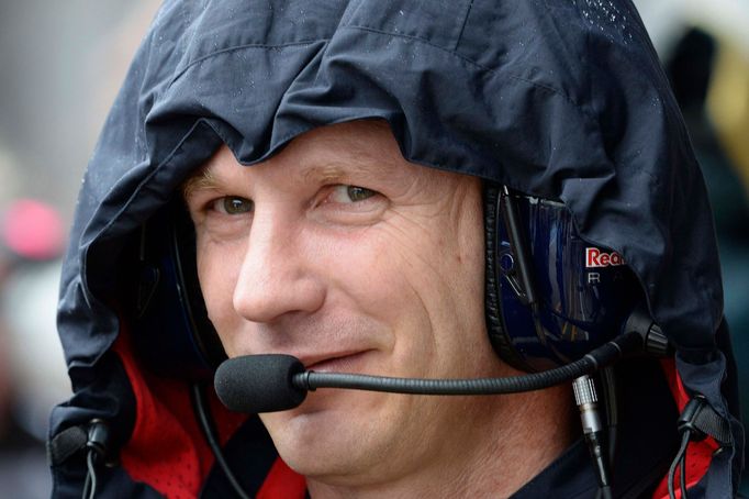 Red Bull Formula One Team Principal Christian Horner watches from the pit lane during first practice ahead of the British Grand Prix at the Silverstone Race Circuit, cent