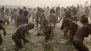 Naga sadhus, or Hindu holymen, attend the first 'Shahi Snan' (grand bath) at the ongoing "Kumbh Mela", or Pitcher Festival, in the northern Indian city of Allahabad January 14, 2013. During the festival, Hindus take part in a religious gathering on the banks of the river Ganges. "Kumbh Mela" will return again to Allahabad in 12 years. REUTERS/Ahmad Masood (INDIA - Tags: RELIGION SOCIETY) TEMPLATE OUT Published: Led. 14, 2013, 7:28 dop.