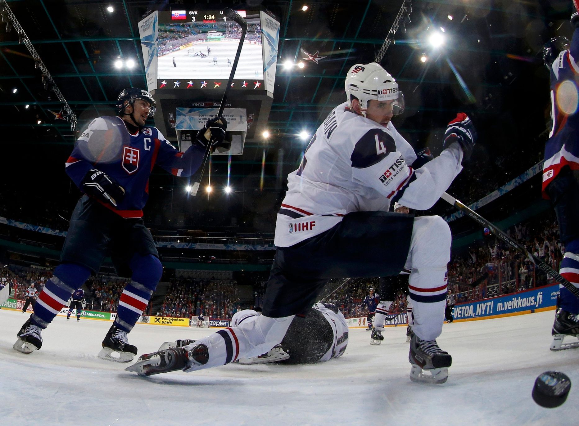 Slovakia's Sersen celebrates their goal next to Team USA's M