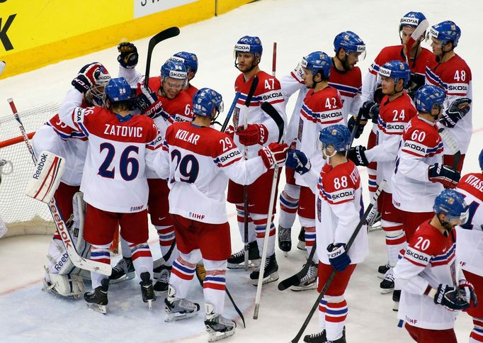 Players of the Czech Republic celebrate after their men's ice hockey World Championship Group A game against Norway at Chizhovka Arena in Minsk May 18, 2014. REUTERS/Vasi