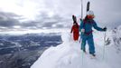 Austrian freeride skier Karin Huttary (R) and Jon Oerarbaeck from Sweden walk on top of Seegrube mountain during a freeride skiing tour in Innsbruck January 19, 2013. Backcountry or freeride skiers ski away from marked slopes with no set course or goals, in untamed snow, generally in remote mountainous areas. Picture taken January 19, 2013. REUTERS/ Dominic Ebenbichler (AUSTRIA) Published: Led. 21, 2013, 10:19 dop.