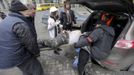 ATTENTION EDITORS - VISUAL COVERAGE OF SCENES OF INJURY OR DEATH - A wounded protester is rushed in a vehicle following violence in Independence Square in Kiev February 2