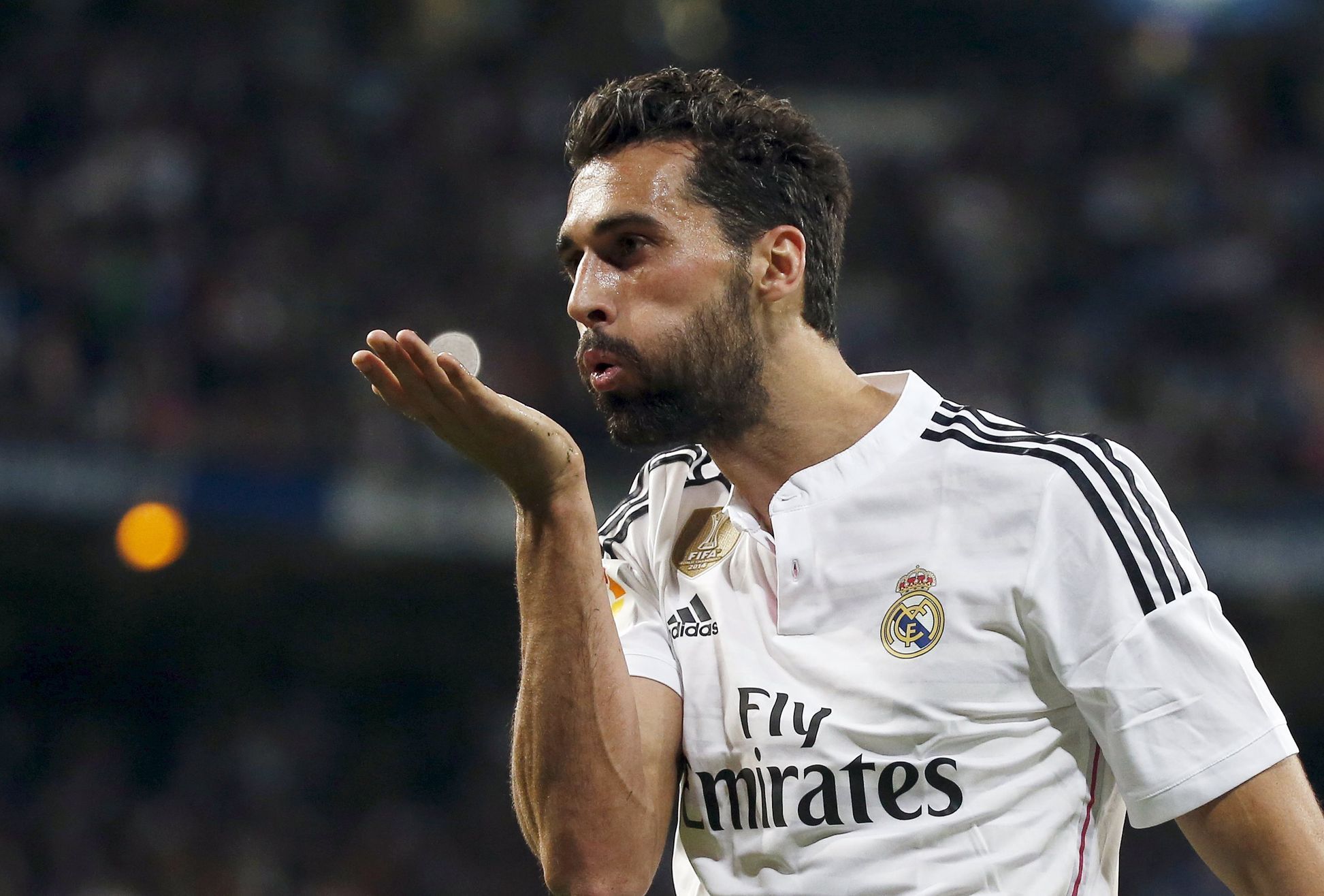 Real Madrid's Arbeloa blows a kiss as he celebrates after scoring a goal against Almeria in Madrid