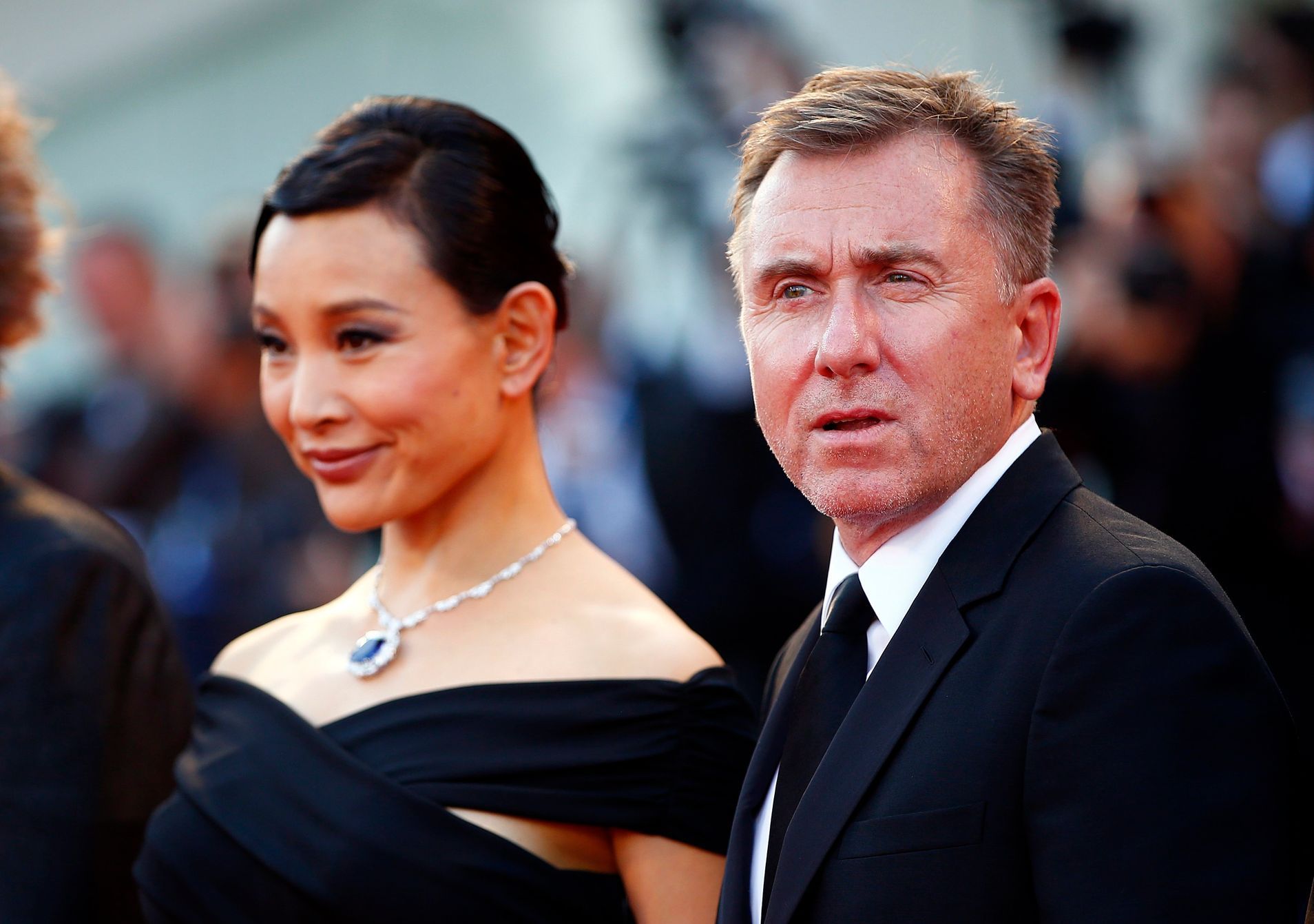 Actors Roth and Chen arrive on the red carpet for the opening ceremony of the 71st Venice Film Festival in Venice