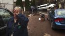 A woman weeps after learning that a neighbor presumed missing is okay while cleaning out her home in a neighborhood heavily damaged by Hurricane Sandy in the New Dorp Beach neighborhood of the Staten Island borough of New York, November 1, 2012. Deaths in the United States and Canada from Sandy, the massive storm that hit the U.S. East Coast this week, rose to at least 95 on Thursday after the number of victims reported by authorities in New York City jumped and deaths in New Jersey and elsewhere also rose. REUTERS/Lucas Jackson (UNITED STATES) Published: Lis. 1, 2012, 10:33 odp.