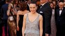 Presenter Daisy Ridley, wearing Chanel, poses on the red carpet at the 88th Academy Awards in Hollywood, California