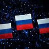 Soči 2014, závěrečný ceremoniál: ruské vlajky pro nejlepší závodníky běhu na 50 km
