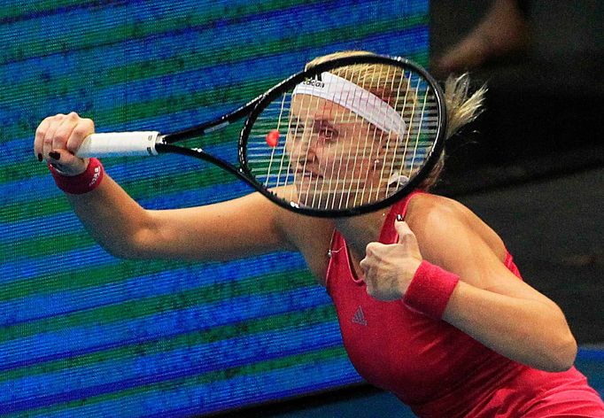 Kristina Mladenovic of the UAE Royals team reacts during her women's singles tennis match against Maria Sharapova of the Manila Mavericks team at the International Premie