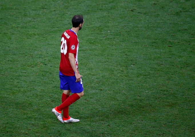 Atletico Madrid's Juanfran reacts after missing penalty goal