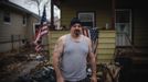 Anthony Morotto poses for a photograph in front of the home he rents in New Dorp Beach, Staten Island November 14, 2012. At the height of Hurricane Sandy, Morotto heard screaming from behind his home, one of only a handful in the area with a second story. He tied a rope to his waist and pulled three neighbours from the flood in through his second story window. At least 23 people died on Staten Island mostly from drowning in storm surge flooding. Picture taken November 14, 2012. REUTERS/Mike Segar (UNITED STATES - Tags: DISASTER ENVIRONMENT) ATTENTION EDITORS PICTURE 14 OF 19 FOR PACKAGE 'SURVIVING SANDY' SEARCH 'SEGAR SANDY' FOR ALL PICTURES Published: Lis. 20, 2012, 3:31 odp.