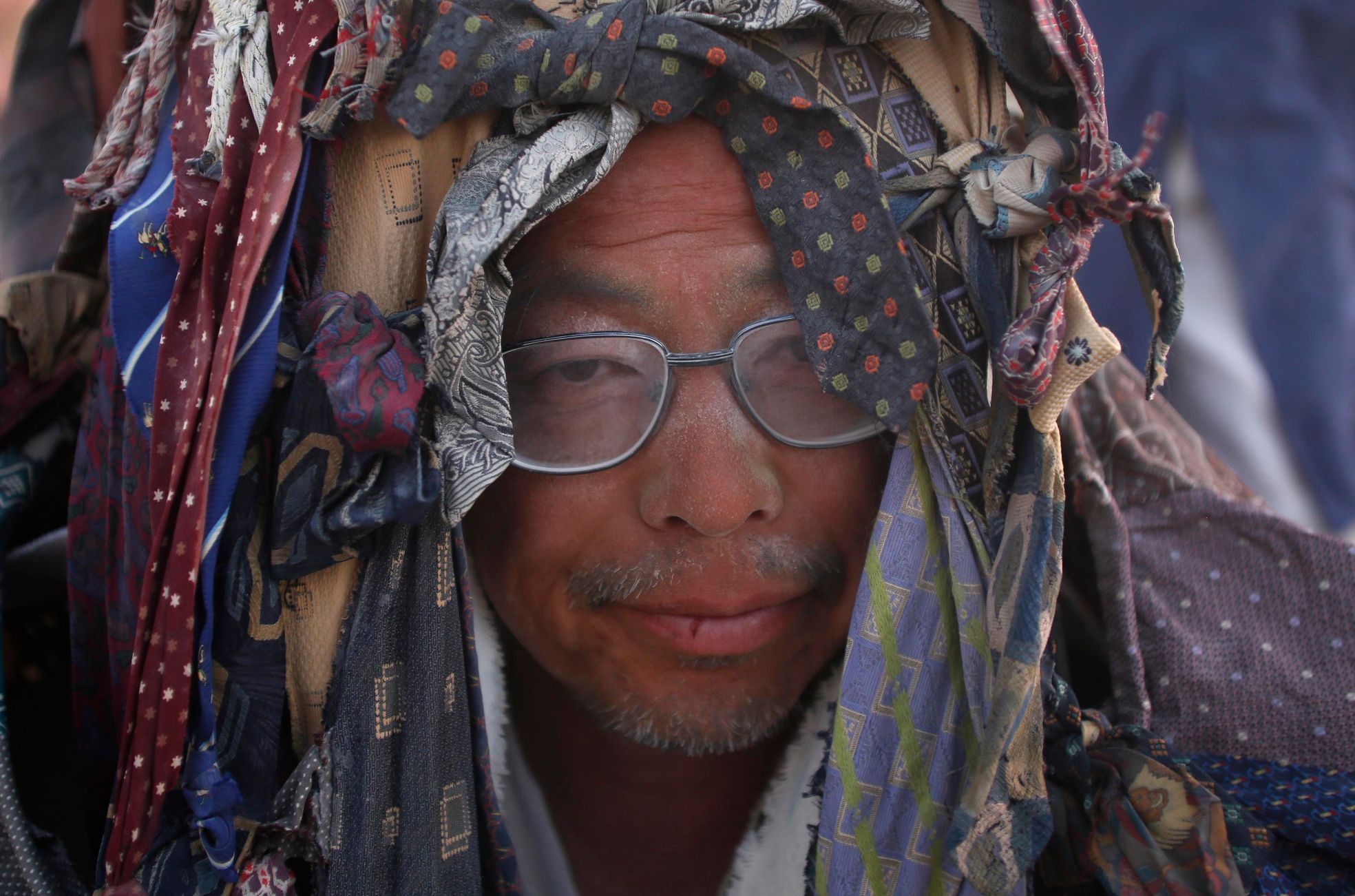 Furuki Takeshi waits for the Man to burn during the Burning Man 2014 &quot;Caravansary&quot; arts and music festival in the Black Rock Desert of Nevada