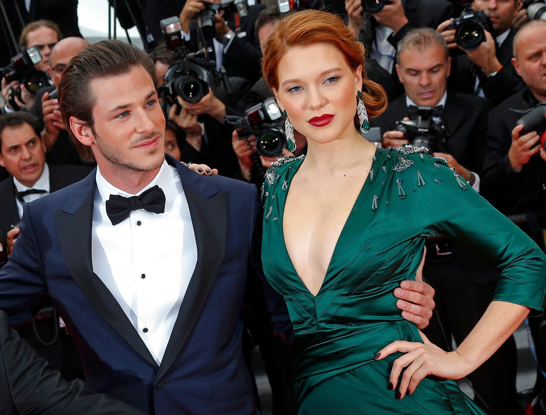Cast members Gaspard Ulliel and Lea Seydoux pose on the red carpet as they arrive for the screening of the film &quot;Saint Laurent&quot; in competition at the 67th Cannes Film Festival in Cannes