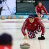 Norway's men's curling team second Christoffer Svae attends a training session in the Ice Cube Curling Center in Sochi