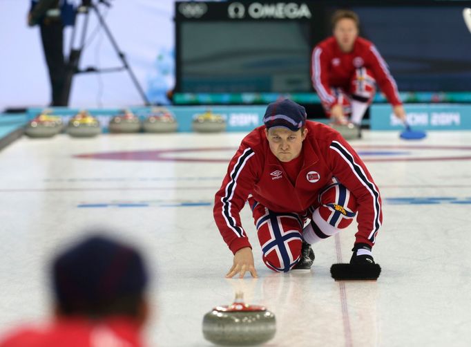 Norway's men's curling team second Christoffer Svae attends a training session in the Ice Cube Curling Center in Sochi February 9, 2014. REUTERS/Ints Kalnins (RUSSIA - Ta