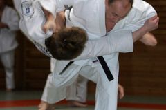 Putin trénoval s reprezentanty v judo, trenérovi dal ruský pas