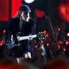 Angus Young of AC/DC performs a medley of songs to open the show at the 57th annual Grammy Awards in Los Angeles