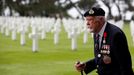 British D-Day veteran Richard Llewellyn arrives for a ceremony at Normandy American Cemetery and Memorial situated above Omaha Beach