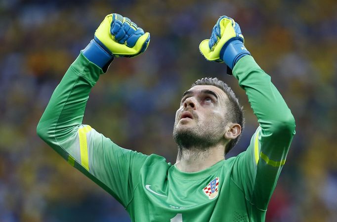 Croatia goalkeeper Stipe Pletikosa reacts during their 2014 World cup opening match against Brazil at the Corinthians arena in Sao Paulo June 12, 2014.REUTERS/Damir Sagol