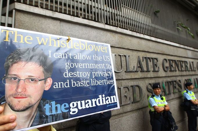 PROTEST IN SUPPORT OF SNOWDEN Protesters supporting NSA whistleblower Edward Snowden, a former contractor at the National Security Agency (NSA), march to the U.S. Consulate at Hong Kong's Central district June 15, 2013. They urge the city's government not to extradite the former spy and slam the US for its surveillance programs. Snowden, 29, has gone to ground in the city after blowing the lid on the US's vast electronic surveillance operation and has vowed to fight any extradition request. The United States has launched a criminal investigation after Snowden, a former CIA technical assistant, leaked details of Washington's secret Internet and telephone surveillance programmes.