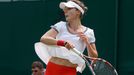 Alize Cornet of France hits a return to Hsieh Su-Wei of Taiwan in their women's singles tennis match at the Wimbledon Tennis Championships, in London June 26, 2013. REUTE