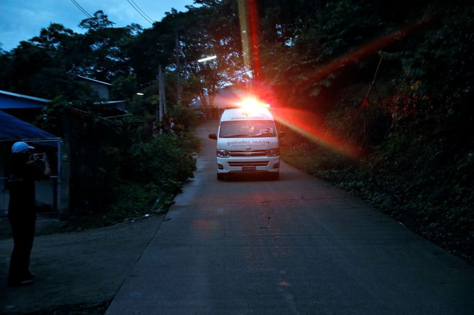 An ambulance believed to be carrying rescued schoolboys travels to a military helipad near Tham Luang cave complex in the northern province of Chiang Rai