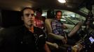 Luis Salgado (L), nicknamed Chucho, gets into the car of his father, Jesus Salgado (R), after they were reunited when Luis arrived in a direct flight from Havana, at Miami airport, March 13, 2013. Chucho was granted a U.S. visa based on his father's status as legal resident in Texas, and he was reunited in Miami with his father, who had escaped Cuba on a frail boat ten years earlier. The Salgados are among many Cubans taking advantage of Cuba's new travel policy in place since last January, which allows citizens to leave the country with just a passport and no need for much-hated exit visas required since 1961. Picture taken March 13, 2013. REUTERS/Desmond Boylan (UNITED STATES - Tags: POLITICS SOCIETY) Published: Dub. 11, 2013, 1:41 odp.