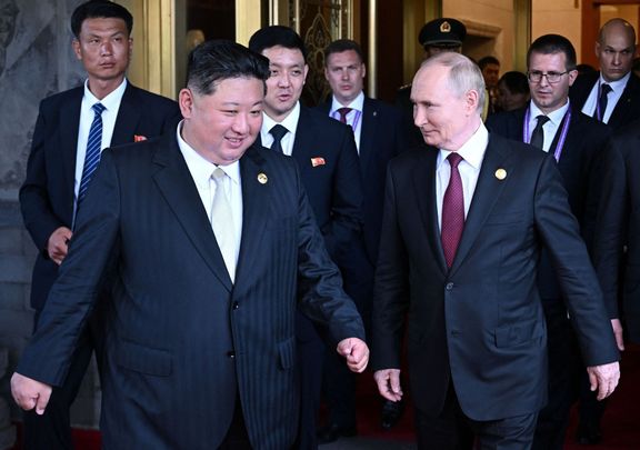 Vladimir Putin a Kim Čong-un.