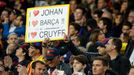 Fans with a banner in tribute to Johan Cruyff before the game