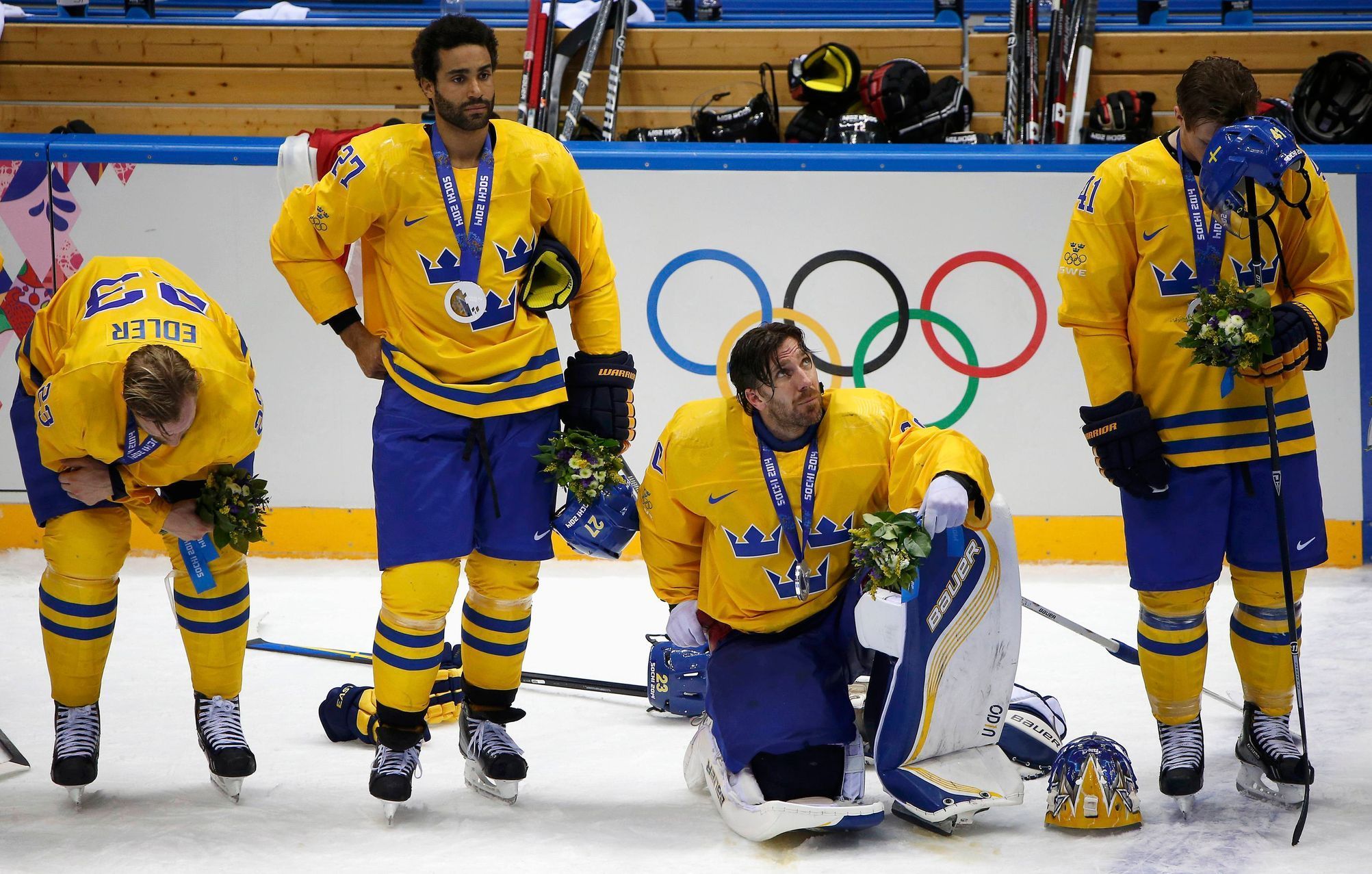 Kanada-Švédsko, finále: smutní Alexander Edler, Johnny Oduya, Henrik Lundqvist a Gustav Nyquist