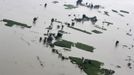 INDIA/ Description: An aerial view shows the flood-affected areas of the Sonitpur district in the northeastern Indian state of Assam July 1, 2012. Incessant heavy rains in northeast India have caused massive flooding and landslides, killing more than 60 people, local media reported on Sunday. Picture taken July 1, 2012. REUTERS/Stringer (INDIA - Tags: DISASTER ENVIRONMENT) Published: Čec. 2, 2012, 7:30 dop.