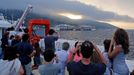 The Costa Concordia cruise liner (in background) is pictured from a ferry as it emerges during the refloating operation at Giglio harbour July 20, 2014.