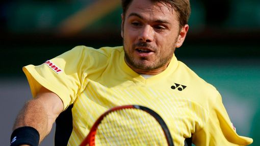 Stan Wawrinka of Switzerland returns a backhand to Guillermo Garcia-Lopez of Spain during their men's singles match at the French Open tennis tournament at the Roland Gar