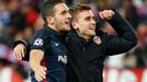 Atletico's Koke and Antoine Griezmann celebrate at the end of the game