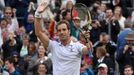 Richard Gasquet of France celebrates after winning his match against Stan Wawrinka of Switzerland at the Wimbledon Tennis Championships in London