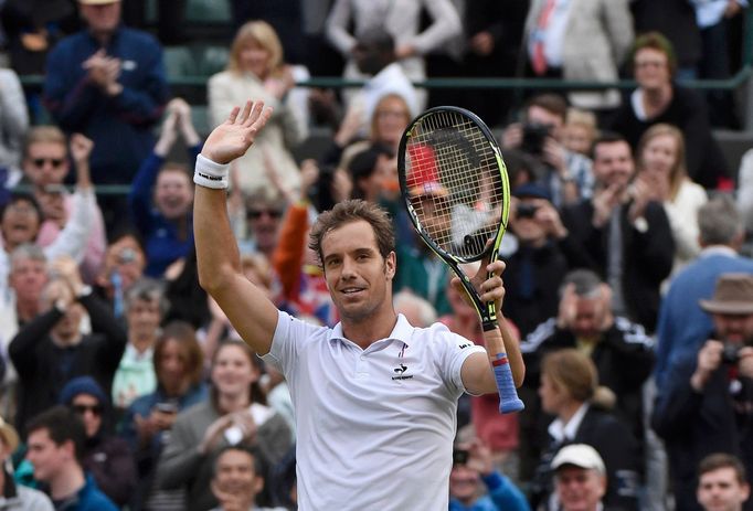 Richard Gasquet of France celebrates after winning his match against Stan Wawrinka of Switzerland at the Wimbledon Tennis Championships in London