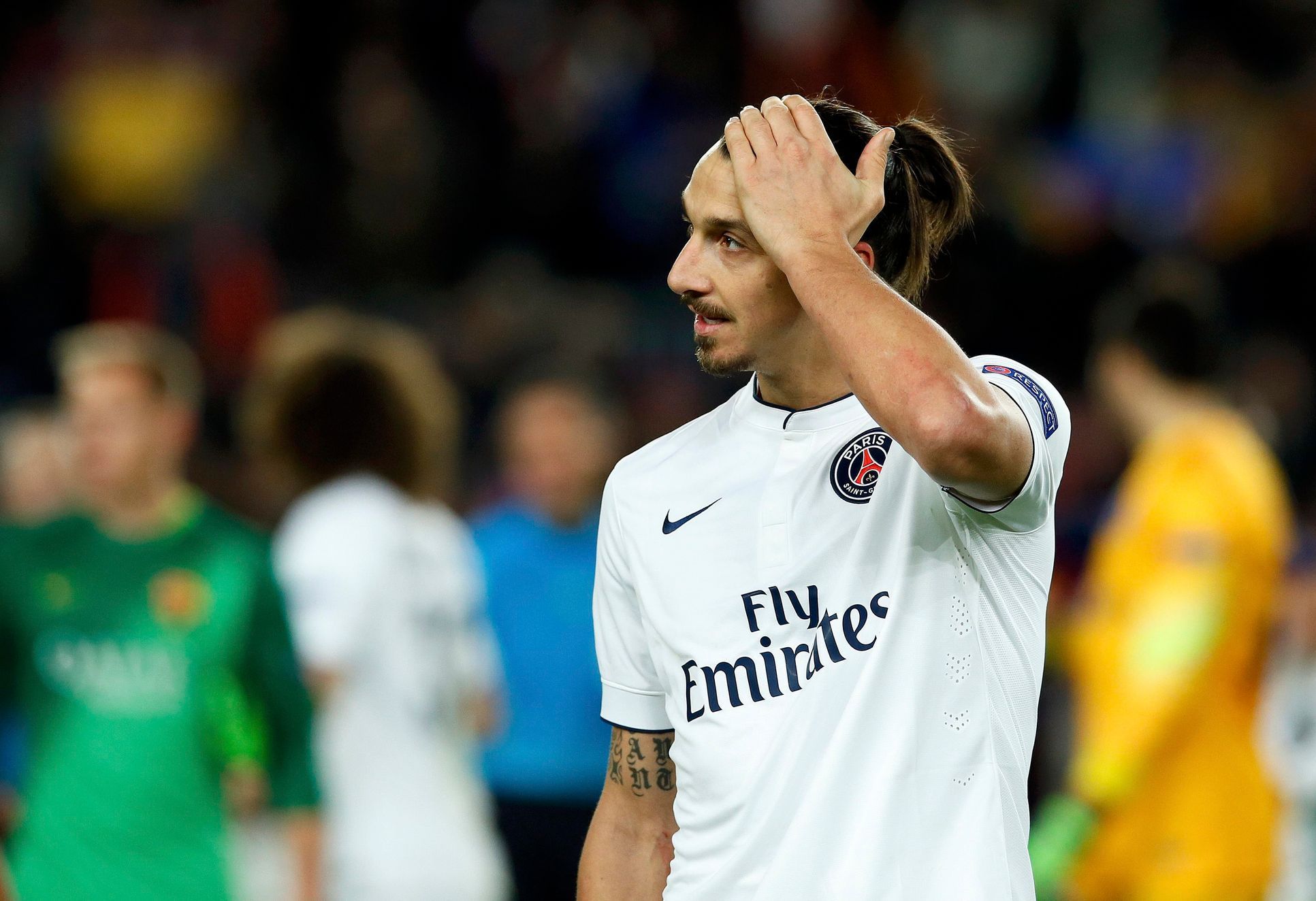 Paris St Germain's Zlatan Ibrahimovic reacts after their Champions League Group F soccer match against Barcelona at the Nou Camp stadium in Barcelona