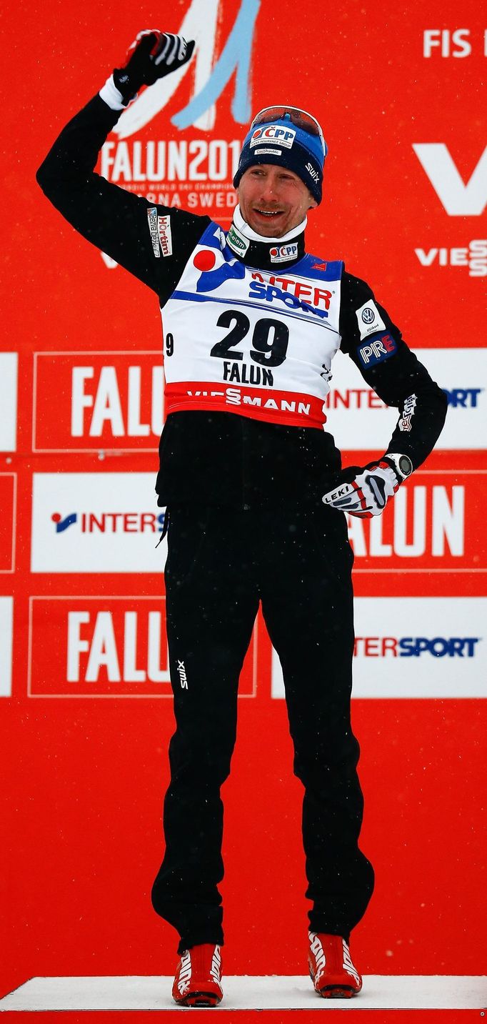 Bauer of the Czech Republic celebrates after the men's cross country 50 km mass start classic race at the Nordic World Ski Championships in Falun