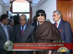 Kaddáfí je schopen zničit Tripolis, varují Rusové.