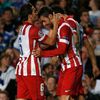 Atletico Madrid's Lopez celebrates with team mate Koke after scoring the first goal for the team during their Champions League semi-final second leg soccer match against Chelsea at Stamford Bridge Sta