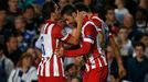 Atletico Madrid's Adrian Lopez (R) celebrates with team mate Koke (L) after scoring the first goal for the team during their Champions League semi-final second leg soccer