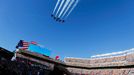 The U.S. Navy Blue Angels demonstration team perform a flight over Levi Stadium before the start of the NFL's Super Bowl 50 football game between the Carolina Panthers an