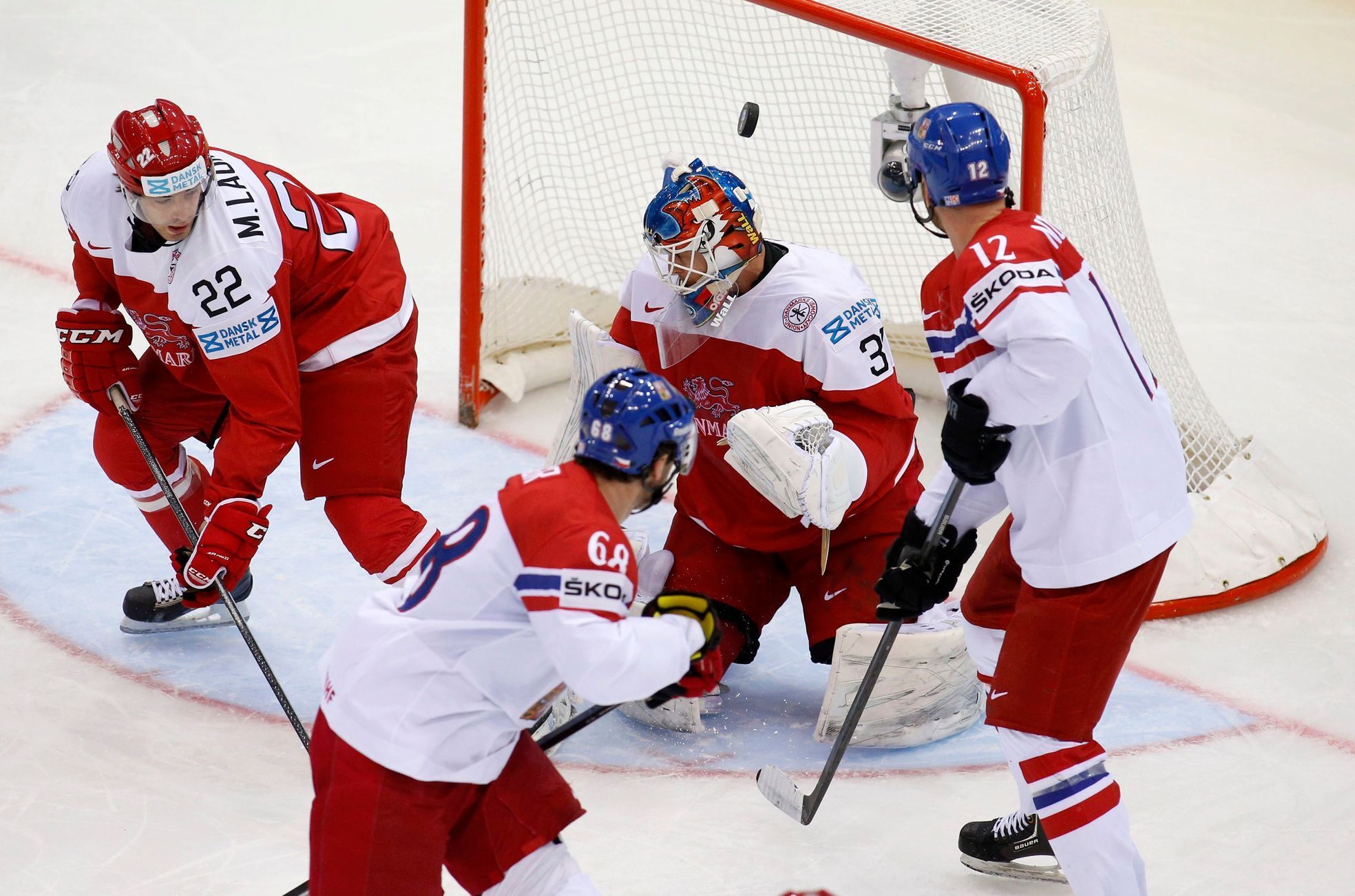 Denmark's goalie Nielsen fails to save a goal of Jaromir Jagr of the Czech Republic  (unseen) during the first period of their men's ice hockey World Championship Group A game at Chizhovka Arena in Mi