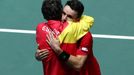 Tennis - Davis Cup Finals - Final - Caja Magica, Madrid, Spain - November 24, 2019   Spain's Roberto Bautista Agut celebrates with captain Sergi Bruguera after winning hi