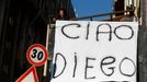 A woman hangs out on a balcony a sheet reading "Bye Diego" to mourn the death of Argentine soccer legend Diego Maradona, in Naples, Italy November 26, 2020. REUTERS/Yara