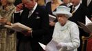 Britain's Queen Elizabeth (R), Prince Charles (C) and Camilla, Duchess of Cornwall (L) take part in a thanksgiving service to mark the Diamond Jubilee at St Paul's Cathedral in central London June 5, 2012. Four days of nationwide celebrations during which millions of people have turned out to mark the Queen's Diamond Jubilee conclude on Tuesday with a church service and carriage procession through central London. REUTERS/Suzanne Plunkett (BRITAIN - Tags: ROYALS ENTERTAINMENT SOCIETY ANNIVERSARY) Published: Čer. 5, 2012, 1:20 odp