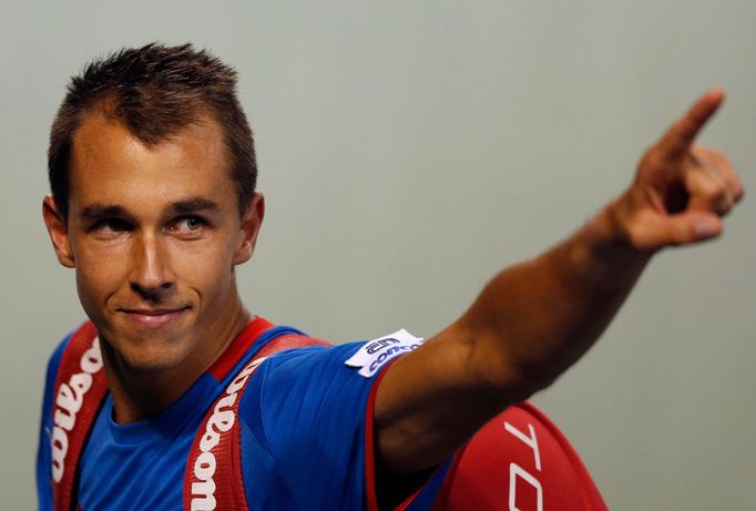 Czech Republic's Rosol gestures to the crowd as he leaves the court after winning the match against Japan's Daniel during their Davis Cup quarter-final match in Tokyo