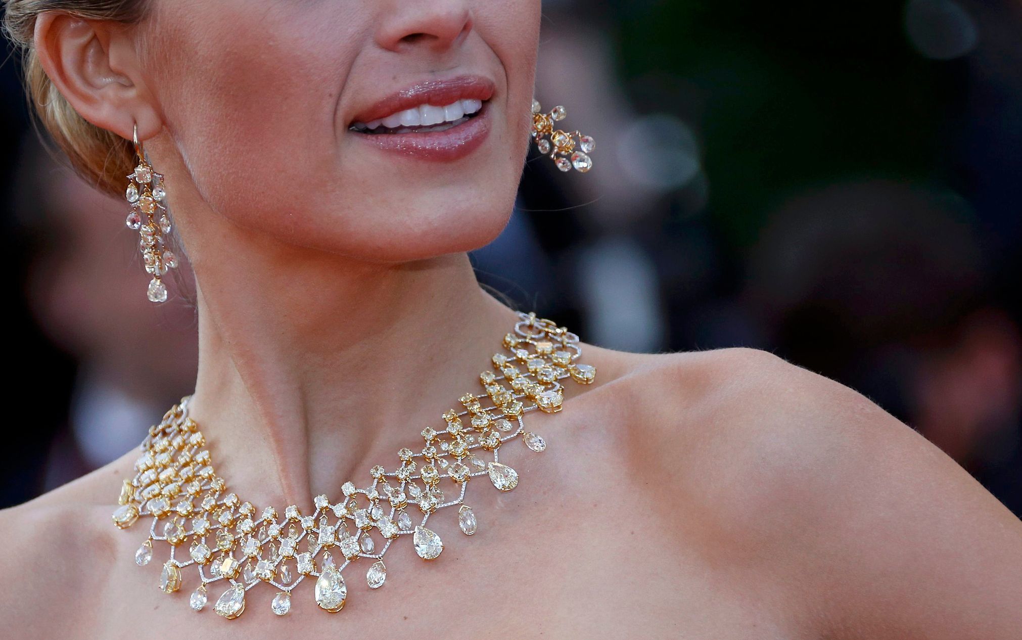 Jewellery worn by model Petra Nemcova are pictured as she poses on the red carpet for the screening of the film &quot;Deux jours, une nuit&quot; at the 67th Cannes Film Festival in Cannes